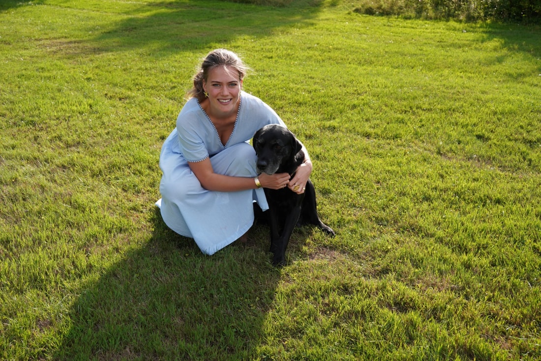 Daisy Dollar and her dog